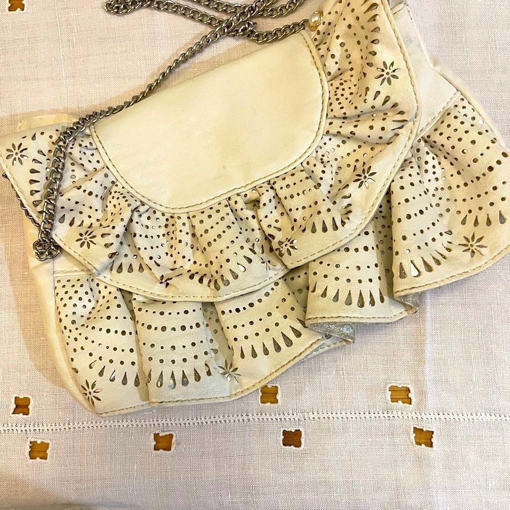 Little white soft ruffled embellishment with silver chain